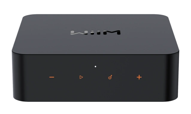Front view of WiiM Pro Plus with the WiiM logo on the top panel and orange touch controls for volume, playback, and presets