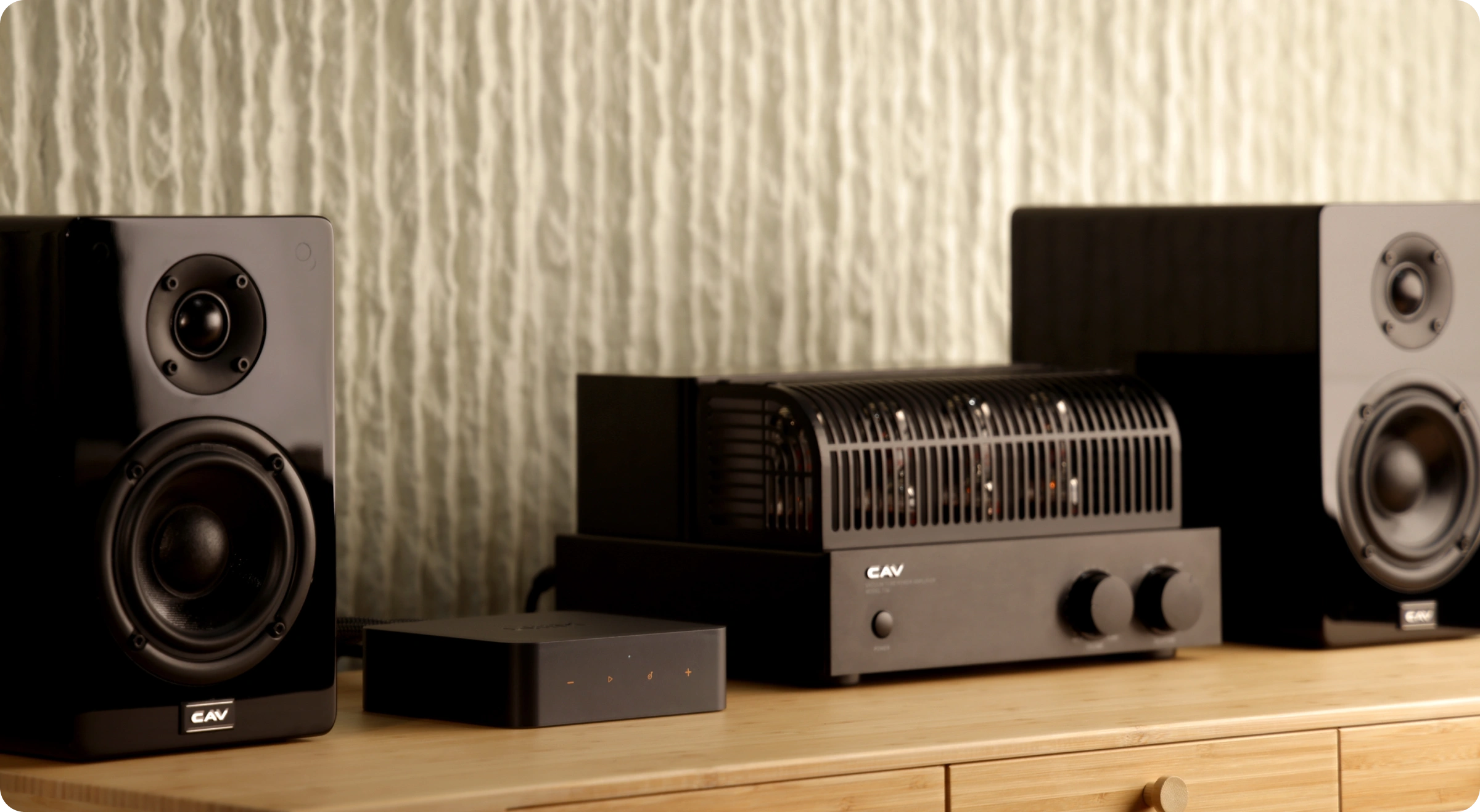WiiM Pro connected to an amplifier and a pair of speakers